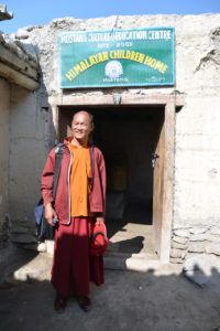 Geshe Sonam in front of the school that he founded in Jomsom Nepal
